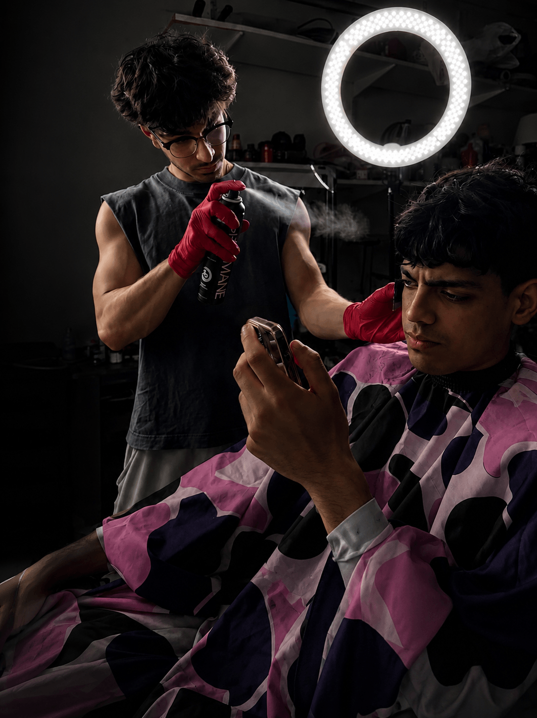 Mercy Cuts barber mid-cut